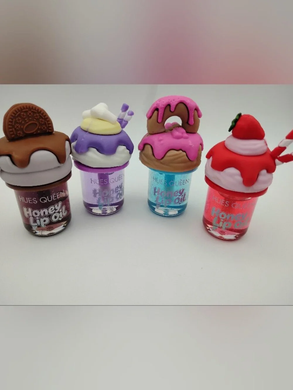 Honey Lip Oil With A Cookie, Donut, Strawberry, & Milkshake Top